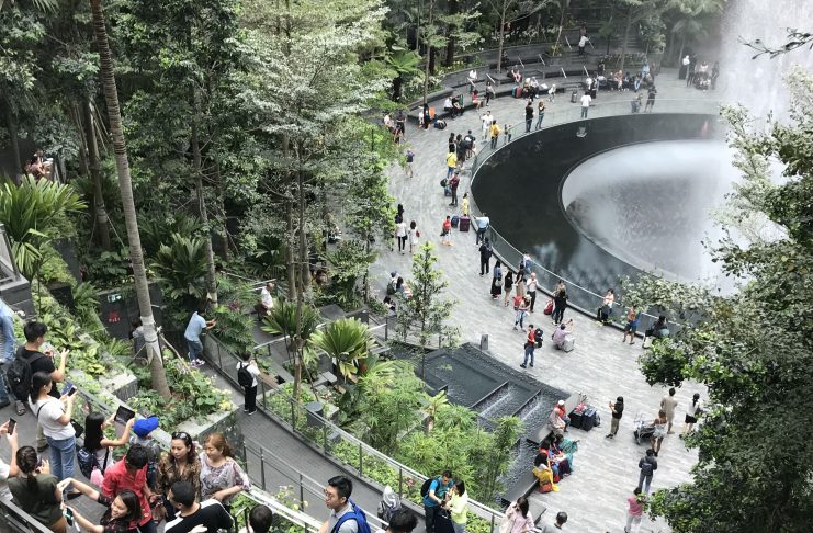 people gathering in Singapore airport