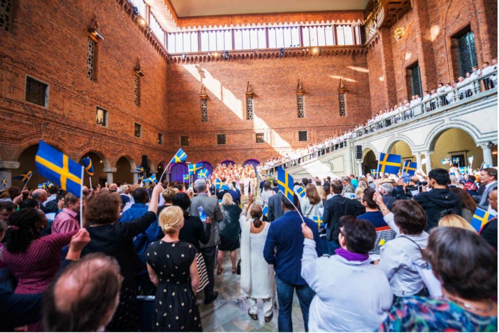 Laying the poundation_New citizens gathering in Stockholm City Hall on Swedish National Day 
